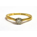 AN 18CT GOLD SMALL DIAMOND SOLITAIRE RING the illusion set round brilliant cut diamond approx. 0.