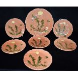 A CONTINENTAL MAJOLICA DESSERT SERVICE by Zell, Germany, relief moulded dandelion decoration on a