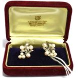 A MIKIMOTO BOXED PAIR OF PEARL AND SILVER SCREW BACK EARRINGS Each comprising 6 Mikimoto cultured
