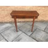 19TH CENTURY MAHOGANY FOLD OVER TEA TABLE, raised on square tapering legs, 75cm x 92cm x 44cm (