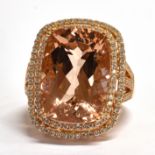 A MODERN MORGANITE AND DIAMOND CLUSTER ROSE GOLD RING The central large rectangular cushion cut