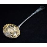 A GEORGIAN SILVER BERRY SPOON LADLE The spoon bowl pierced and gilt with embossed fruit design
