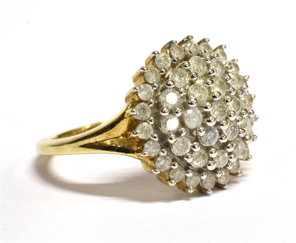 A DIAMOND MULTI-TEIR CLUSTER 9CT GOLD RING the small round brilliant cut diamonds weighing a total - Image 2 of 4