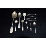 A QUANTITY OF ASSORTED SPOONS AND SUGAR TONGS Comprising a fiddle pattern caddy spoon 1838 by Joseph