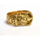 AN EARLY 20TH CENTURY 18CT GOLD BUCKLE RING The traditional buckle ring with fruiting vine