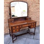 MAHOGANY DRESSING TABLE, with swing mirror above two short drawers, above a further long drawer