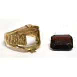 A 9CT GOLD GARNET DRESS RING The hallmarked ring with bark effect shoulders, size P, gold weight