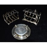 TWO SILVER TOAST RACKS both four slice, the larger of arch design, early 20th century hallmarks,