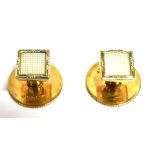 A BOXED PAIR OF YELLOW AND WHITE GOLD COLLAR STUDS the square white top to yellow gold back