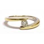 DIAMOND SOLITAIRE 18CT WHITE AND YELLOW GOLD RING The round brilliant cut diamond weighing approx.