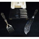 A PAIR OF SILVER HANDLED FISH SERVERS Together with a boxed set of six silver handled butter
