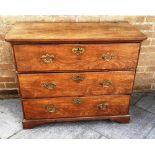 VICTORIAN CHEST OF THREE LONG DRAWERS, each with brass handles and escutcheons and raised on bracket