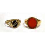 TWO 9CT GOLD STONE SET SIGNET RINGS Comprising a small oval black onyx set, size O; and an oval