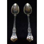 A PAIR OF VICTORIAN SILVER QUEENS PATTERN TABLE SPOONS London hallmark for 1838, 22cms long,