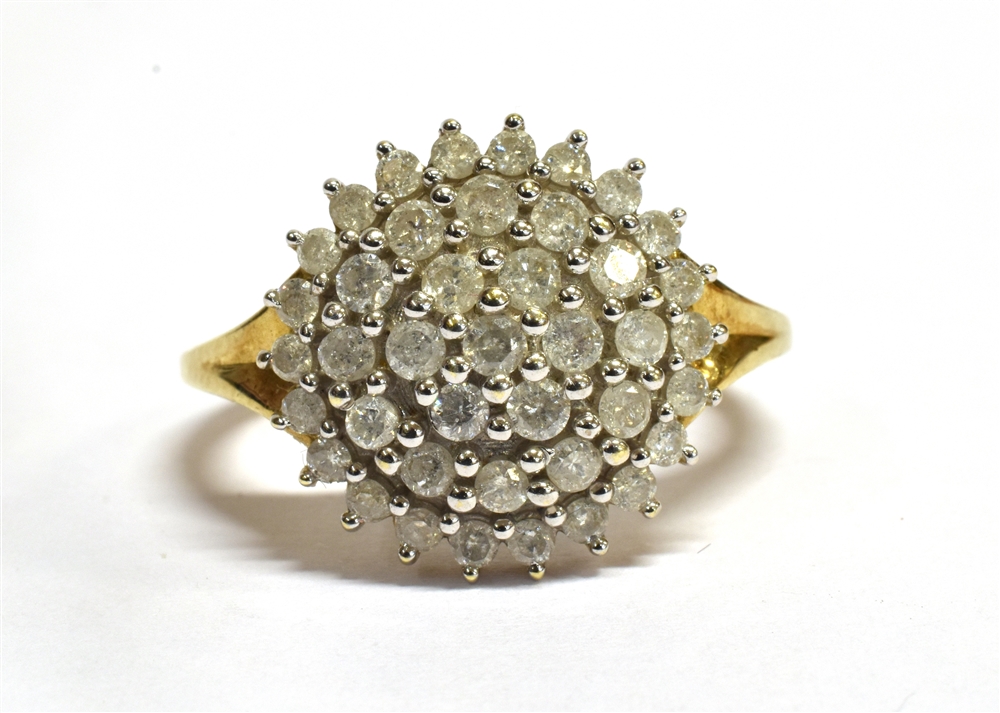 A DIAMOND MULTI-TEIR CLUSTER 9CT GOLD RING the small round brilliant cut diamonds weighing a total