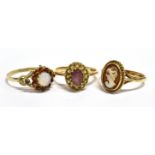 THREE 9CT GOLD DRESS RINGS Comprising an opal and garnet cluster, size Q, an amethyst and white