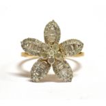 A MODERN DIAMOND FLOWER HEAD CLUSTER GOLD RING The 5 petal cluster comprising small round cut and