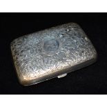 A VICTORIAN SILVER CIGAR CASE The rounded corner rectangular case with all over leaf and scroll