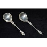 A PAIR OF VICTORIAN APOSTLE SPOONS The apostle or scholar topped spoons of ornate design with barley