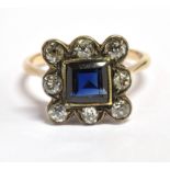 A LATE 19TH/EARLY 20TH CENTURY SAPPHIRE AND DIAMOND SQUARE CLUSTER RING The central square cut