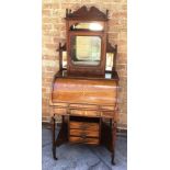 ROSEWOOD AND PARQUETRY INLAID CYLINDER DESK, with a raised mirrored back having a galleried top, the