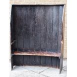 18TH CENTURY HIGH BACK CURVED SETTLE, with panelled back, 180cm x 135cm x 39cm