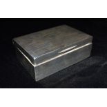 SILVER CIGARETTE BOX Of traditional rectangular shape with engine turned decoration to lid 14 cms