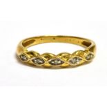 M3097-4 AN 18CT GOLD DIAMOND SET HALF ETERNITY RING five small round eight cut diamonds to front,