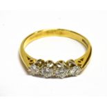 A DIAMOND FOUR STONE RING Four round brilliant cut diamonds with a total diamond weight of approx.