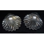 A PAIR OF VICTORIAN SILVER SHELL DISHES by Mappin & Webb, London, hallmark for 1887, 12cm long,