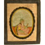 INDIAN SCHOOL: a painted miniature oval portrait of a seated nobleman, possibly Ranjit Singh, the