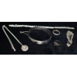 SIX ITEMS OF SILVER JEWELLERY Comprising a bangle; a bracelet with small padlock fastener; a