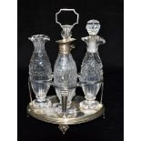 A GEORGIAN SILVER FOUR PIECE GLASS The oval silver stand, 21 cms high, London hallmark for 1802,