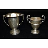 TWO SMALL SILVER TROPHY CUPS Tallest 8cms, total silver weight approx. 96.3 grams Condition Report :