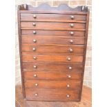 A VICTORIAN MAHOGANY COLLECTOR'S CABINET with ten graduated drawers, the top with a shaped three-