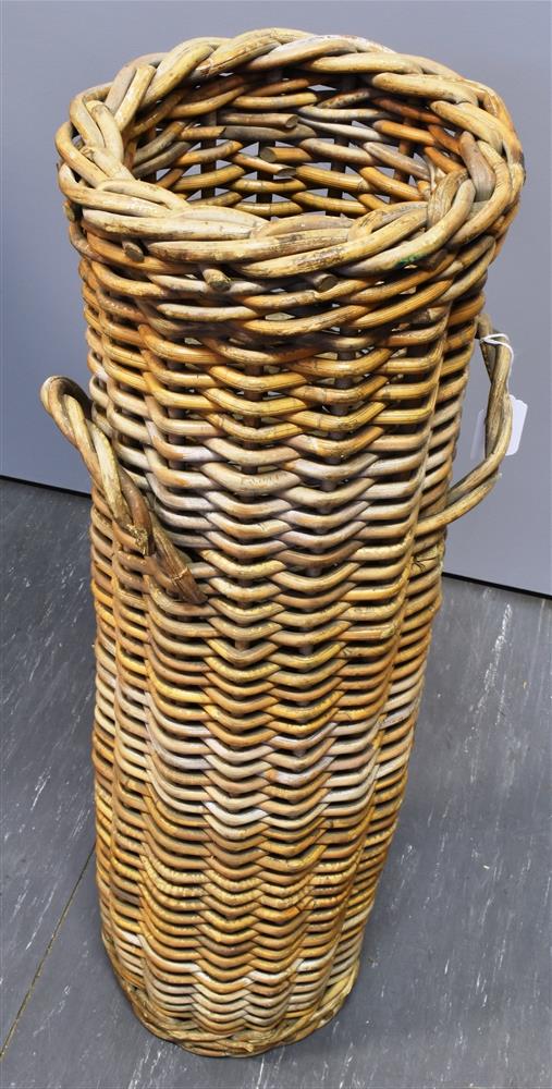 A CYLINDRICAL WICKER COACHING UMBERELLA HOLDER with twin carrying handles. Diameter 23cm, Height