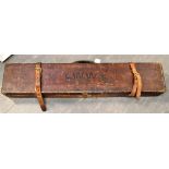 A LEATHER GUN CASE with initials 'C.W.W.' and green baize lined interior, 84 x 17cm, 10cm deep