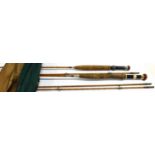 TWO 'GEORGE H. KING OF ELGIN CANE RODS with cork handles and bags (2)