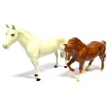 A BESWICK FIGURE OF A STANDING GREY HORSE. A/F 20cm and another of a chestnut horse with a front leg