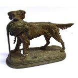 A CAST FIGURE OF A RETREIVER holding a pheasant in it's mouth on a shaped oval base. Height 30cm,