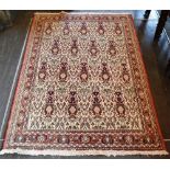 A CREAM GROUND RUG, 105cm x 150cm