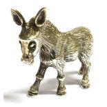 A MODERN SMALL SILVER MODEL OF A DONKEY The small realistically modelled donkey 5cm high stamped