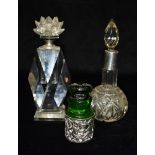 AN ART DECO STYLE EP MOUNTED GLASS SCENT BOTTLE with screw-off floral top ,16.5cm high; a silver