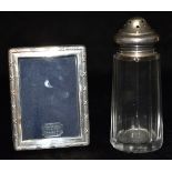 TWO ITEMS OF SILVERWARE Comprising a modern Mappin & Webb small silver photograph frame with easel