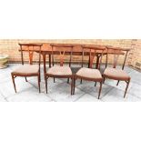 A H MCINTOSH OF KIRKCALDY: an extending rosewood dining table with two integral folding leaves,