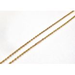 A LATE VICTORIAN/EDWARDIAN 9CT GOLD CHAIN The fancy knot design links to a barrel snap clasp,