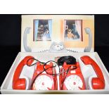 A BOXED SET OF 1960S ITALIAN RED PLASTIC CHILDREN'S TELEPHONES by VI.PA. Padova Condition Report :