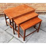 A DANISH NEST OF THREE TEAK COFFEE TABLES the largest 66cm x 42cm, 49cm high Condition Report :