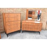 A G-PLAN STYLE FIVE DRAWER CHEST and matching dressing chest, each with loop handles and ebonised