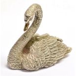 A MODERN SMALL SILVER MODEL OF A SWAN The realistically cast model of a swan 8cms long, hallmarked